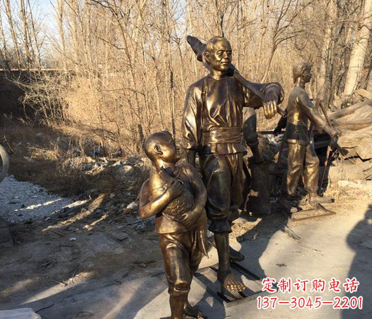 周口抱着鱼的儿童街边小品铜雕