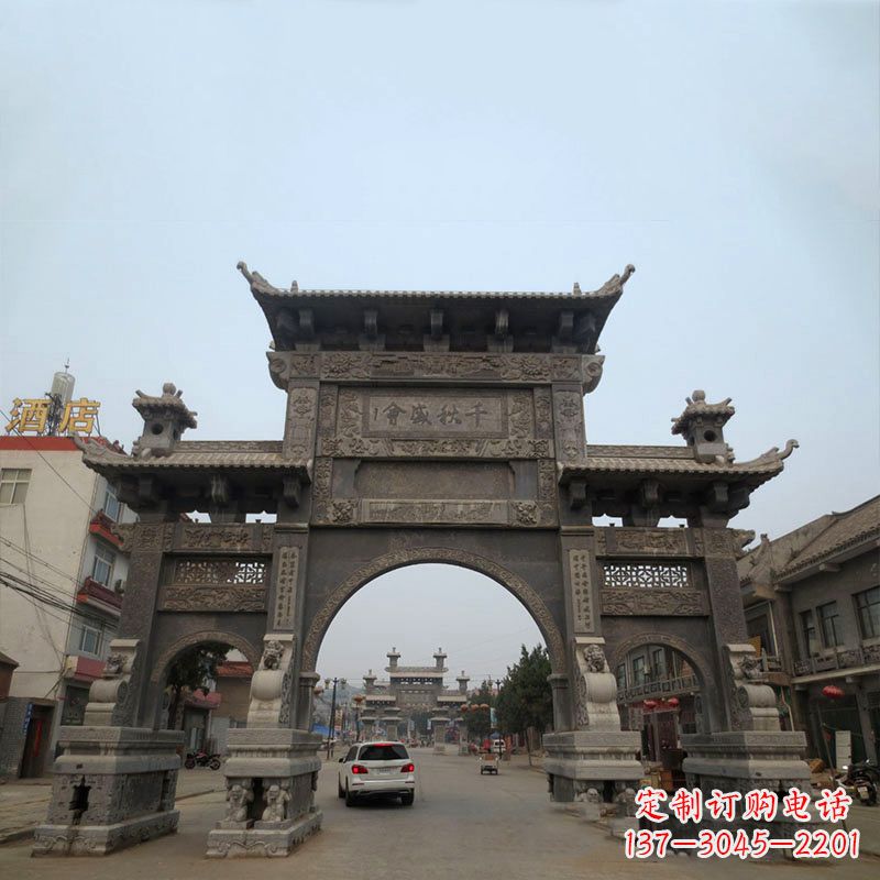 周口城市街道仿古三门石雕牌楼