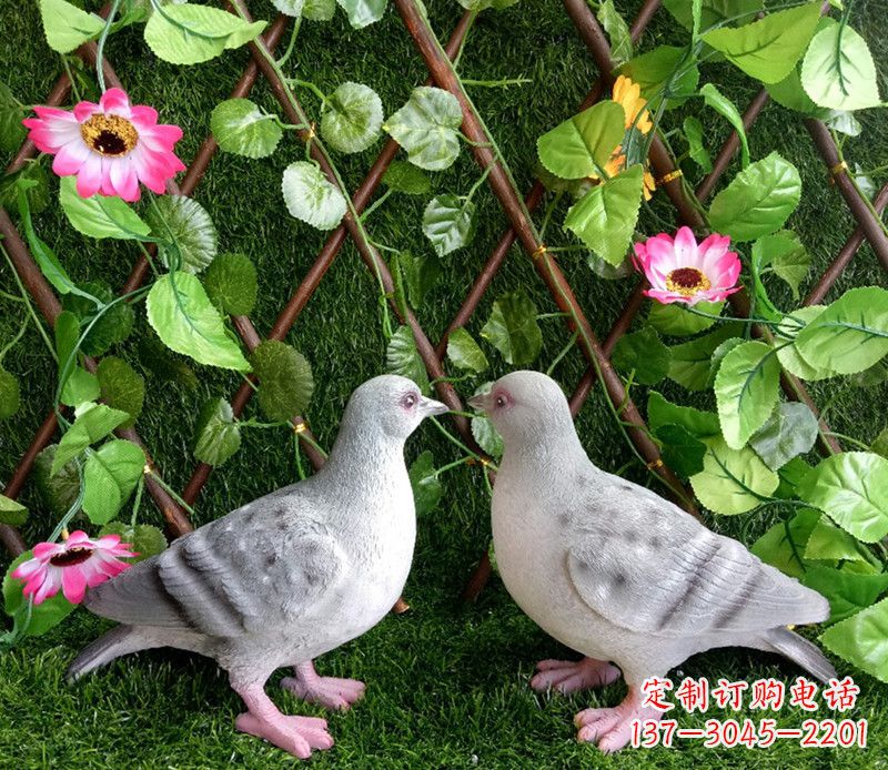 周口雕塑小女孩一只手拿书一手和平鸽
