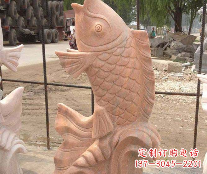 周口公园景观晚霞红石雕鱼喷泉