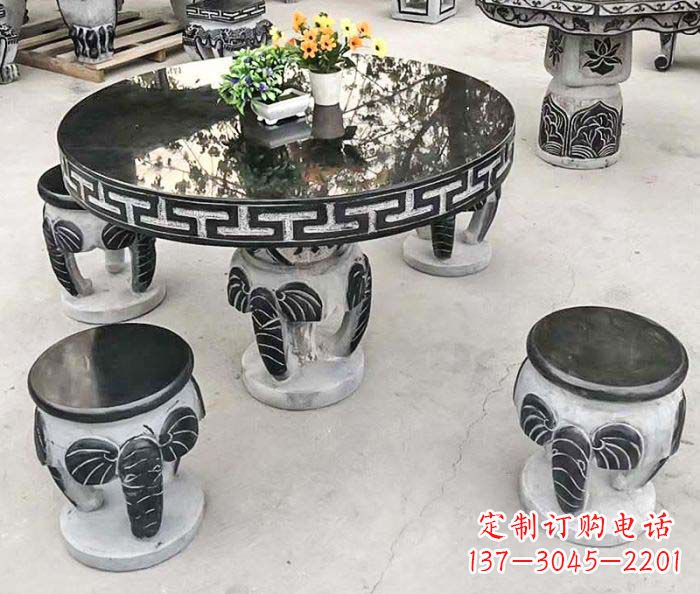 周口圆形桌凳石雕-为公园景观增添艺术气息