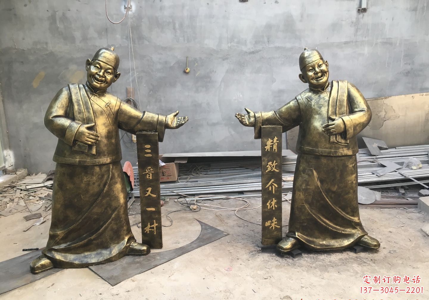 周口酒店门口店小二人物铜雕