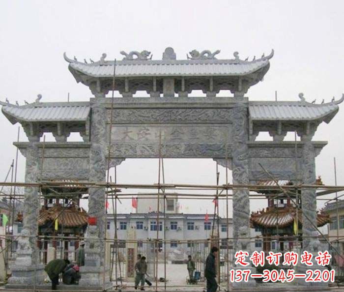 周口农村三门牌坊石雕