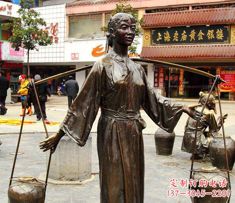 周口挑着罐子的古代女人铜雕