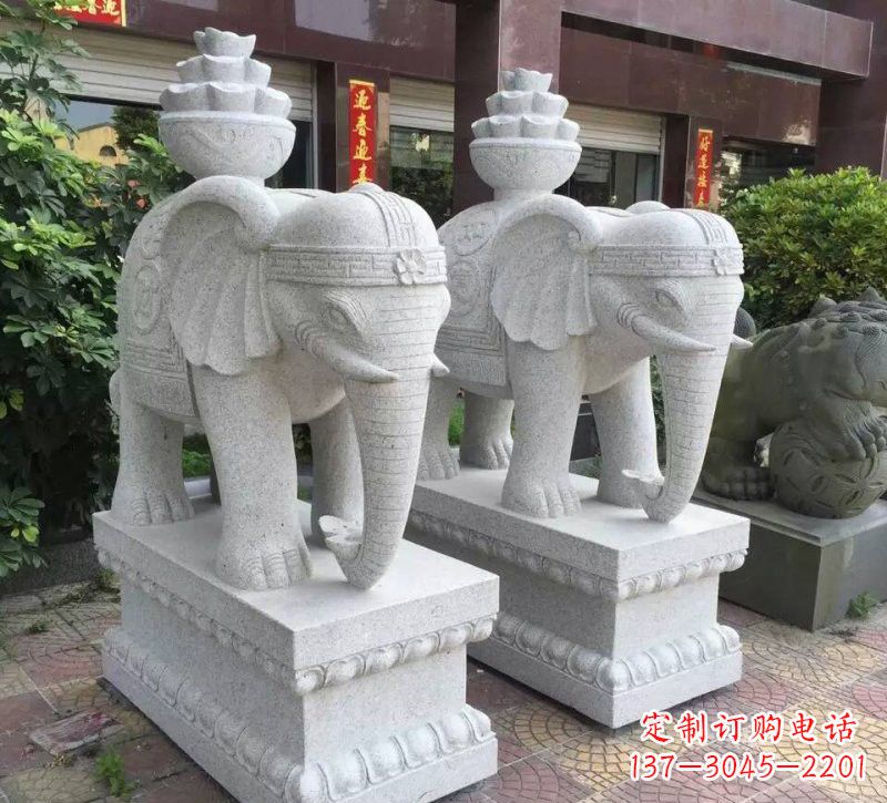 周口驮元宝的大象石雕