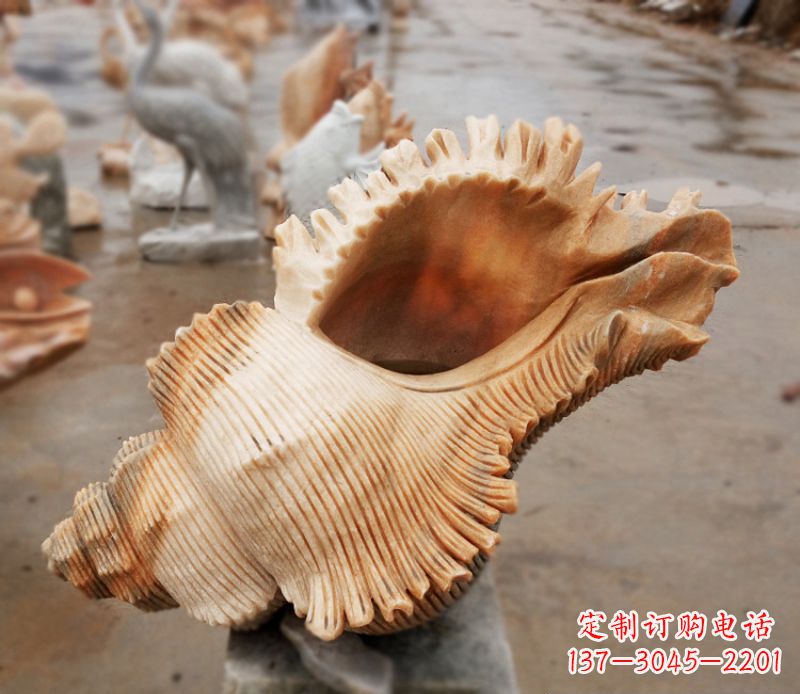 周口晚霞红海螺石雕广场景观雕塑
