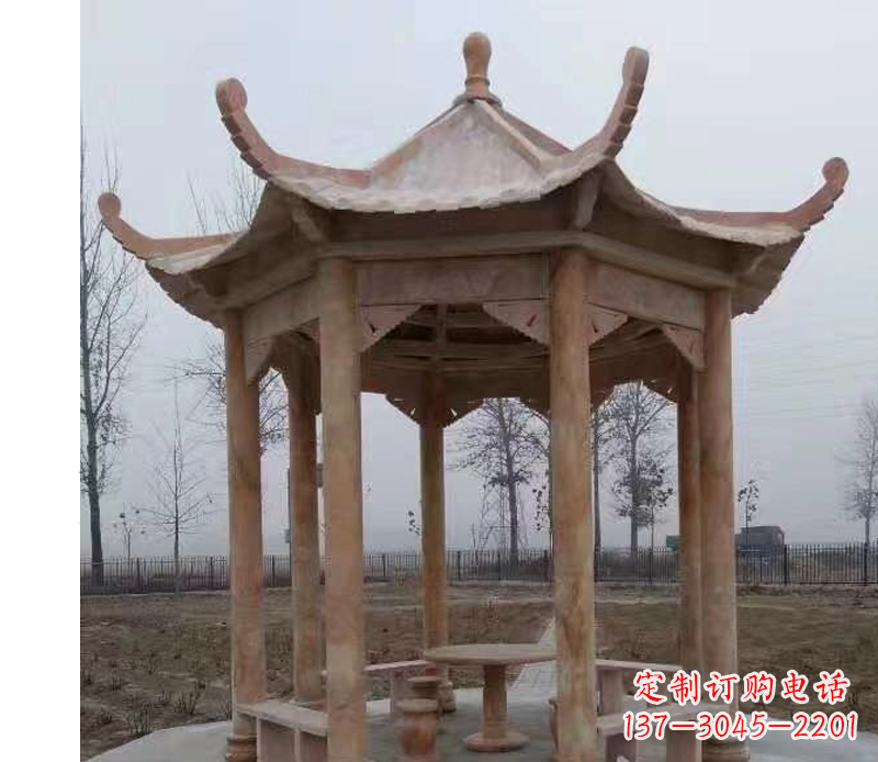 周口公园晚霞红八角石雕凉亭